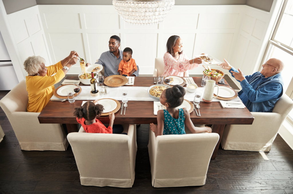 Family having breakfast at the dining table | Warnike Carpet & Tile