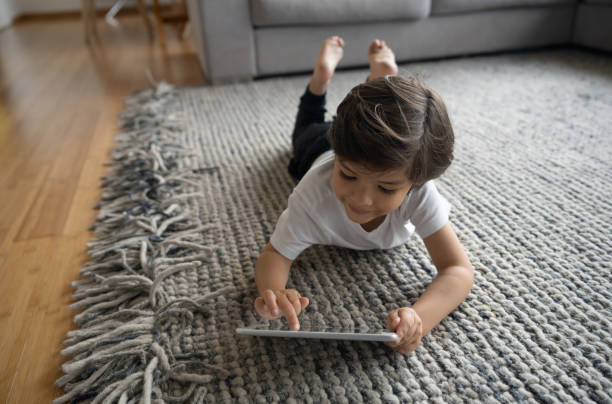 Girl lying on rug | Warnike Carpet & Tile